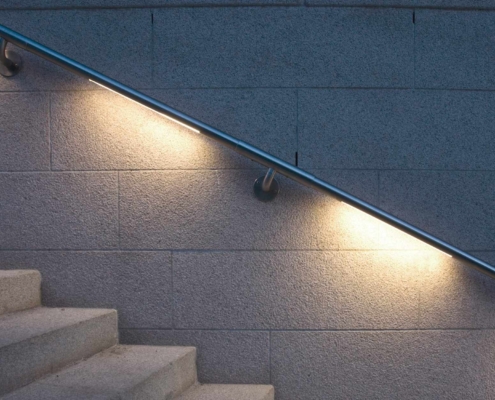 Stair handrail with LED lighting at night