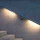Stair handrail with LED lighting at night